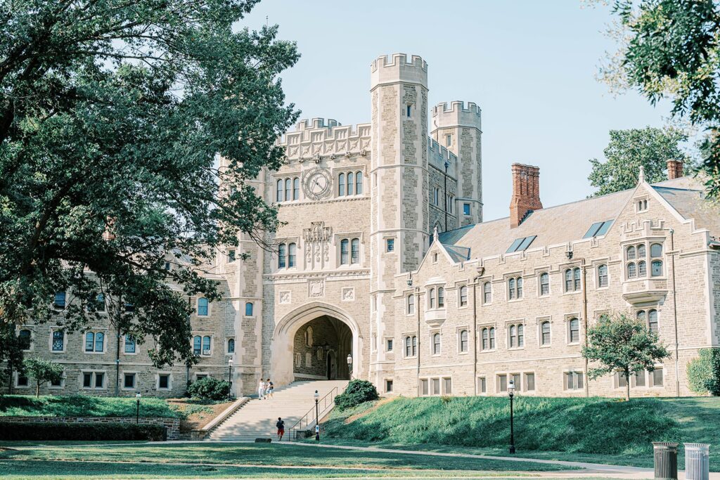 Couple sharing a kiss during romantic engagement session at Princeton University NJ