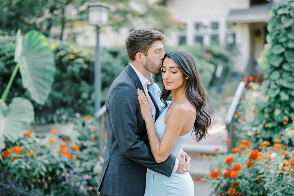 Sayen Gardens engagement session with vibrant floral backdrop
