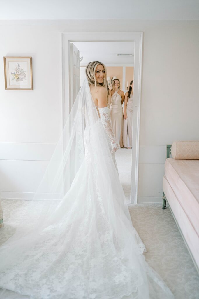Bride in Netta BenShabu lace gown at Appleford Estate wedding