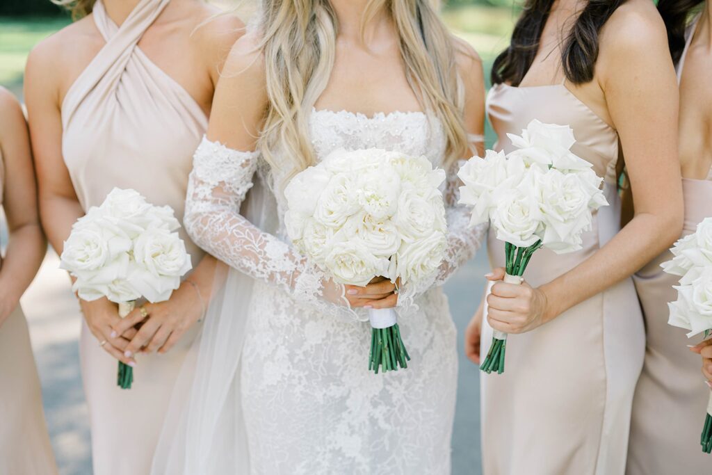 Bride with bridesmaids in champagne gowns at Appleford Estate wedding