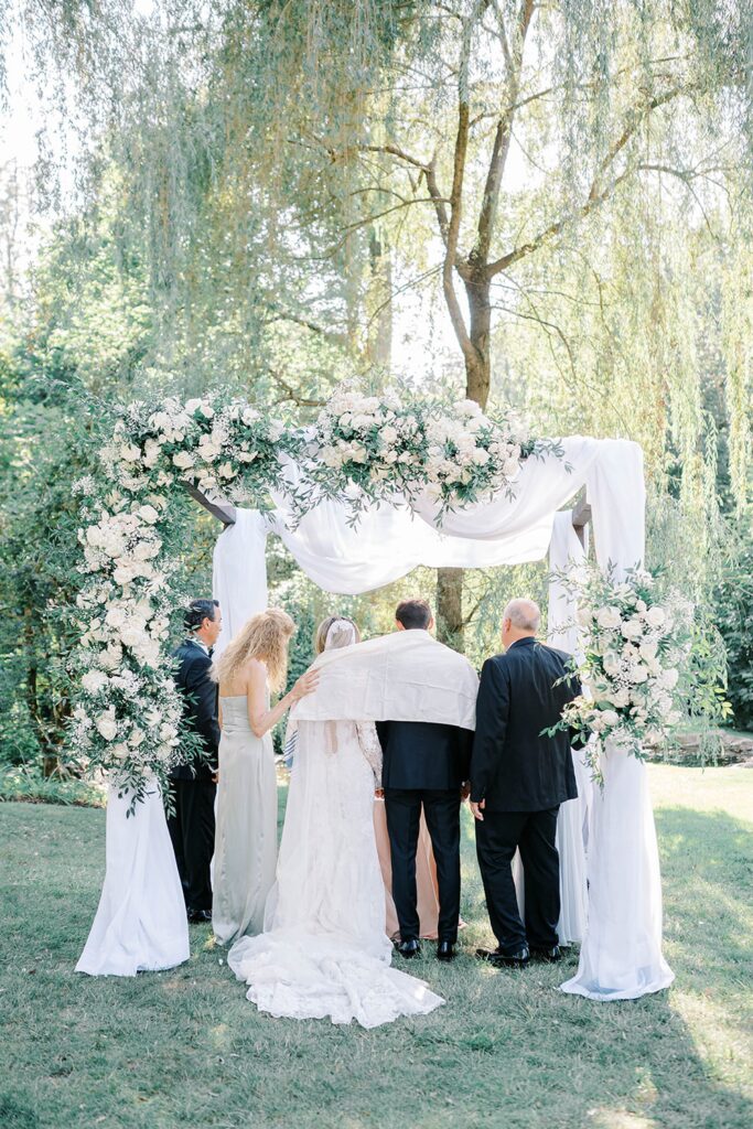 Jewish wedding traditions at Summer Wedding at Appleford Estate