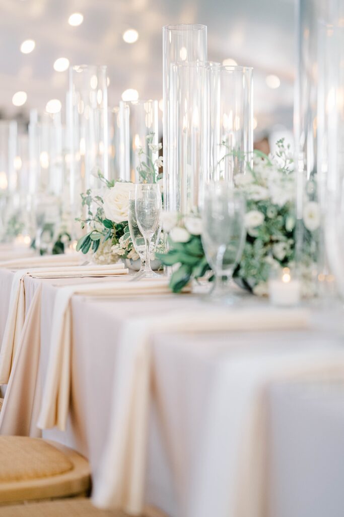 Reception details with taper candles and greenery at Appleford Estate