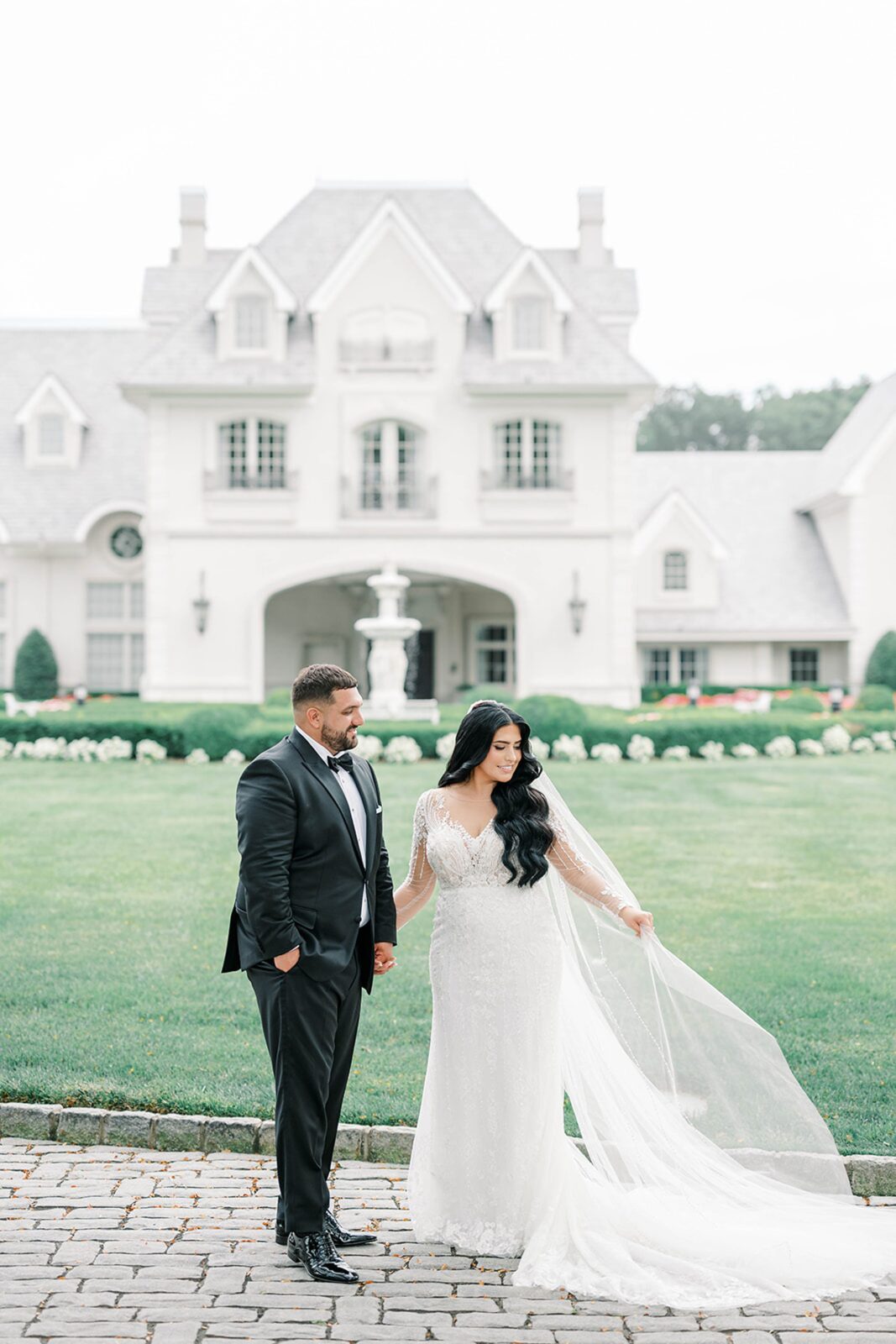 Bride and groom portraits at Park Château gardens
