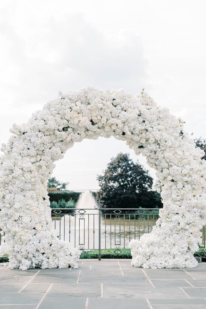 Park Château Estate wedding ceremony with white florals
