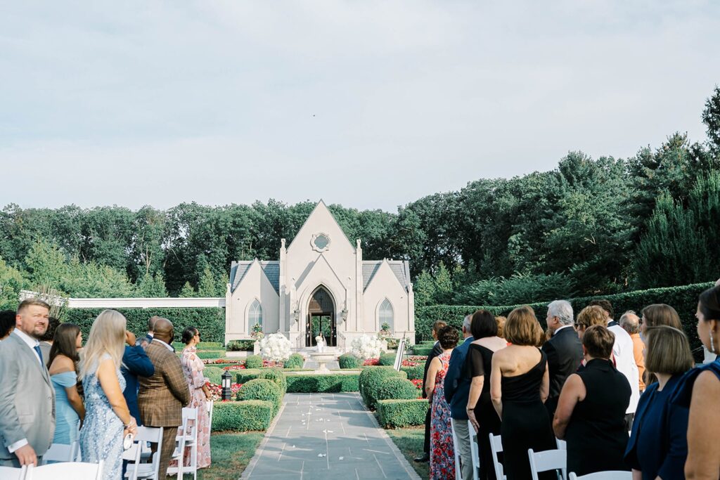 Park Château Estate wedding ceremony with white florals