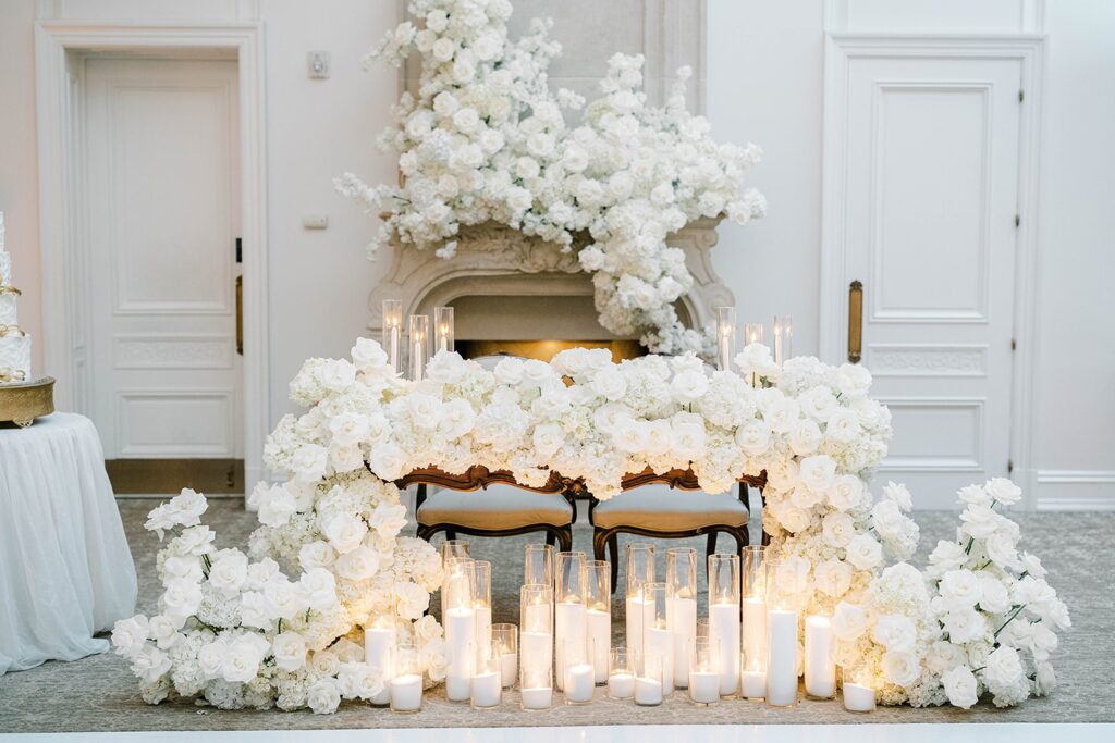 Park Chateau Estate wedding reception ballroom with white florals