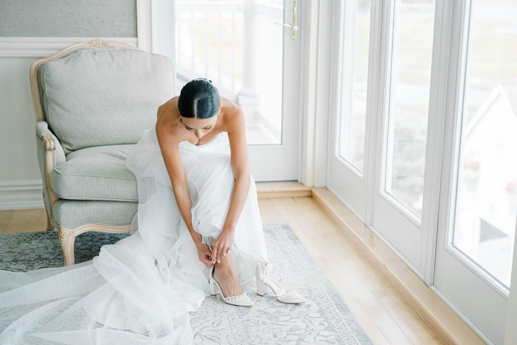 Bride getting ready in bridal suite with mother at Bonnet Island Estate