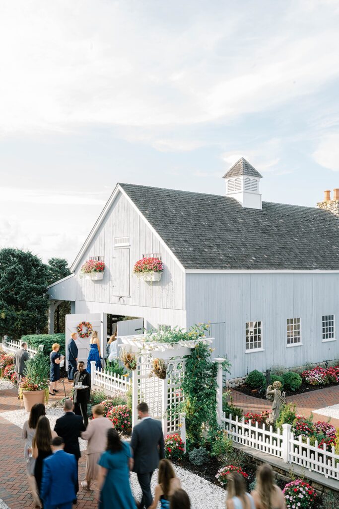 Boathouse Chapel ceremony setup with bright floral arch at Bonnet Island Estate
