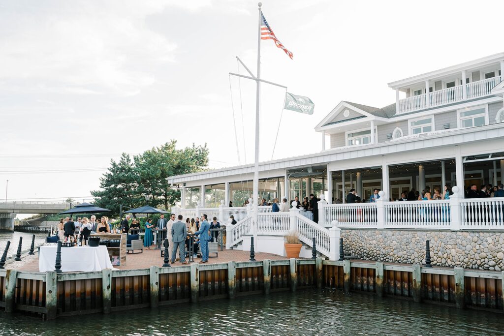 Cocktail hour setup with waterfront views at Bonnet Island Estate wedding