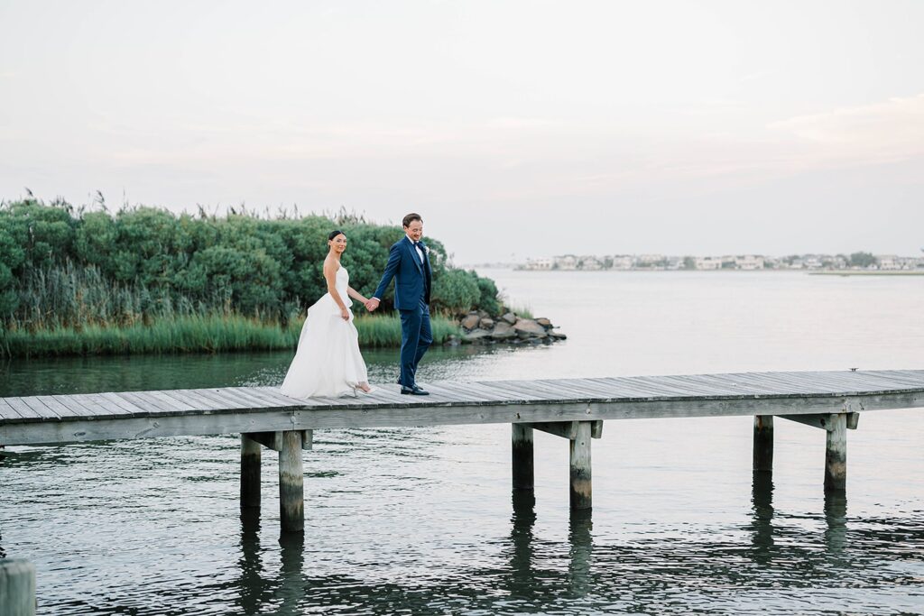 Golden hour couple portraits at Long Beach Island waterfront venue