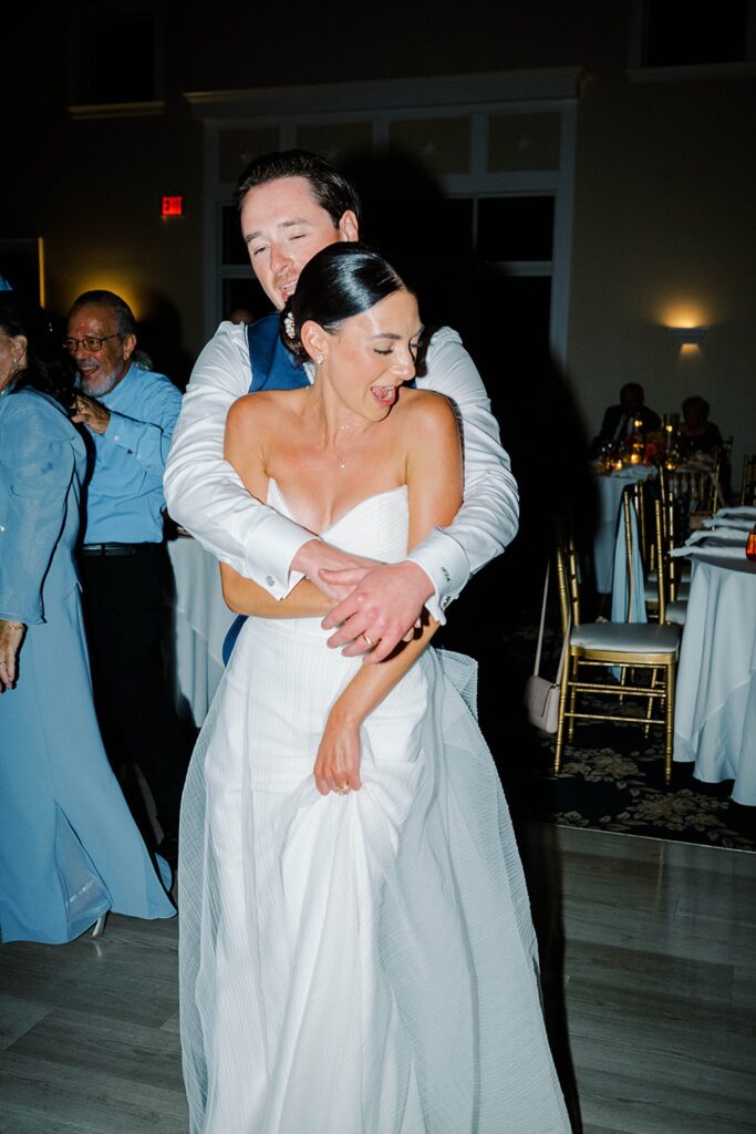 Night portraits of bride and groom at New Jersey coastal wedding venue