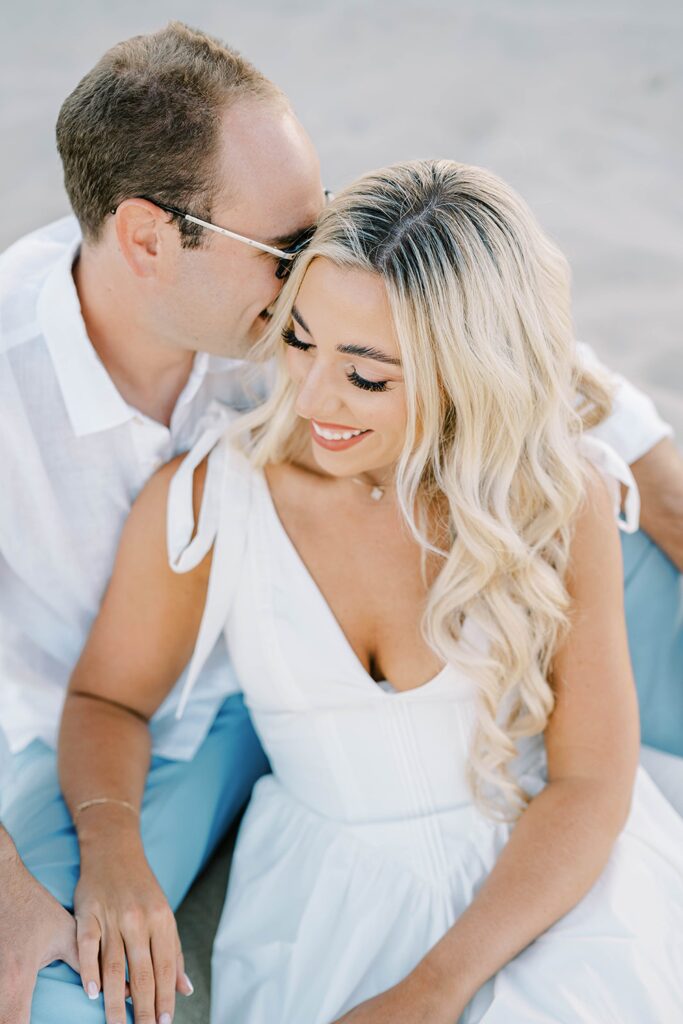 Jersey Shore engagement photos couple walking on Sea Girt beach sunset