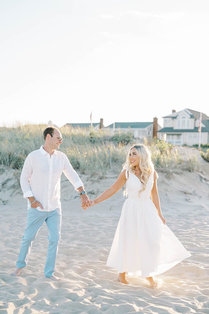 Spring Lake engagement session NJ beach couple romantic moment at sunset