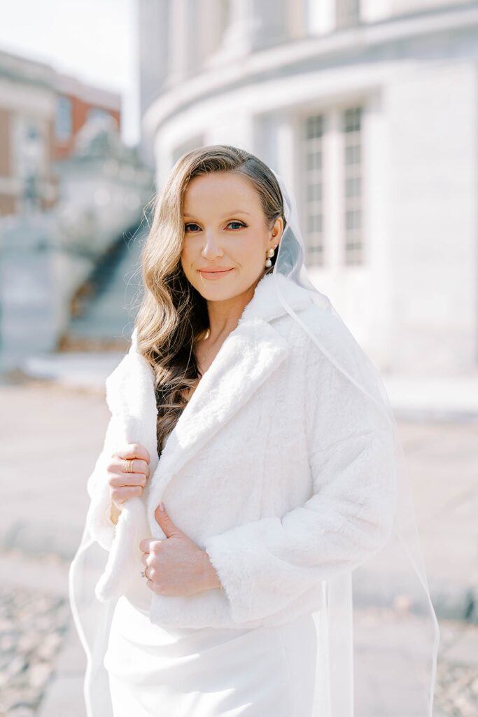Winter Bride taking Wedding portraits during her winter wedding in Philadelphia 