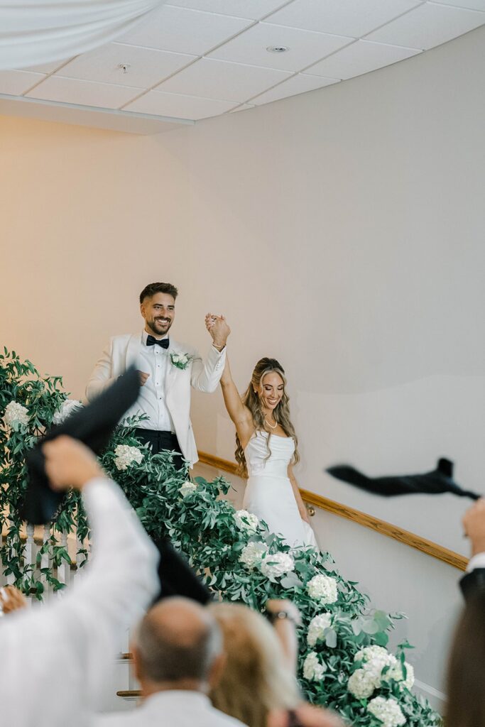 Bride and Groom Entering the wedding reception at Renault Winery 