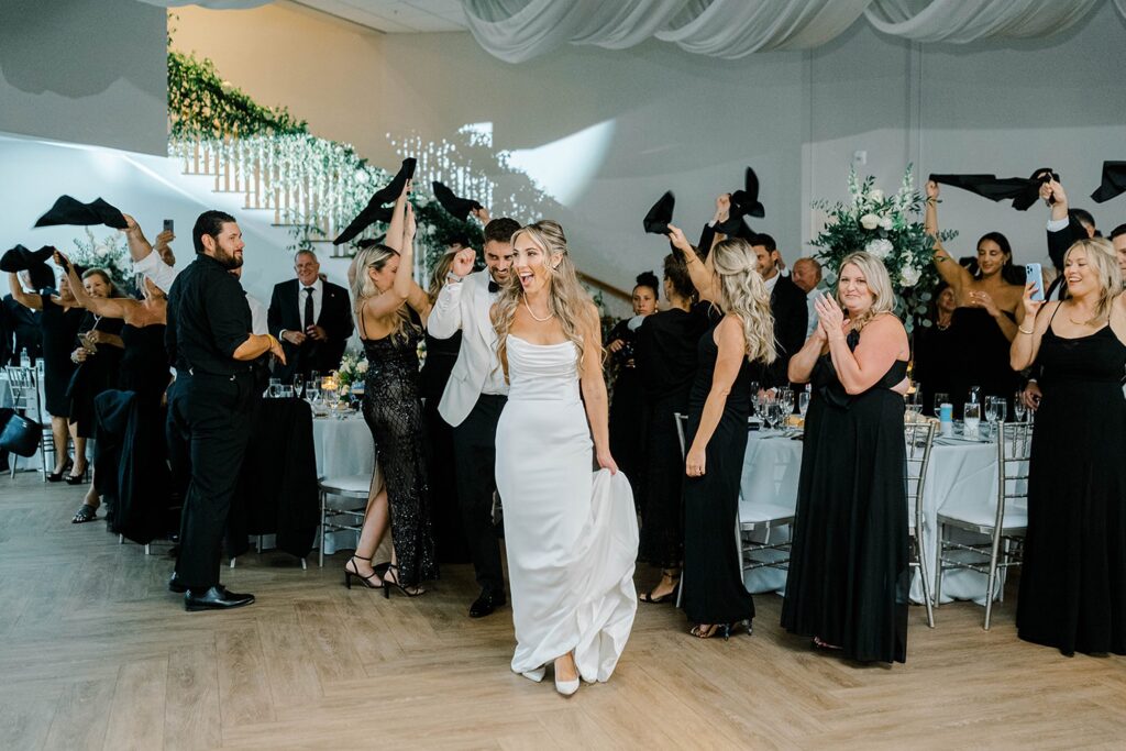 Bride and Groom Entering the wedding reception at Renault Winery 